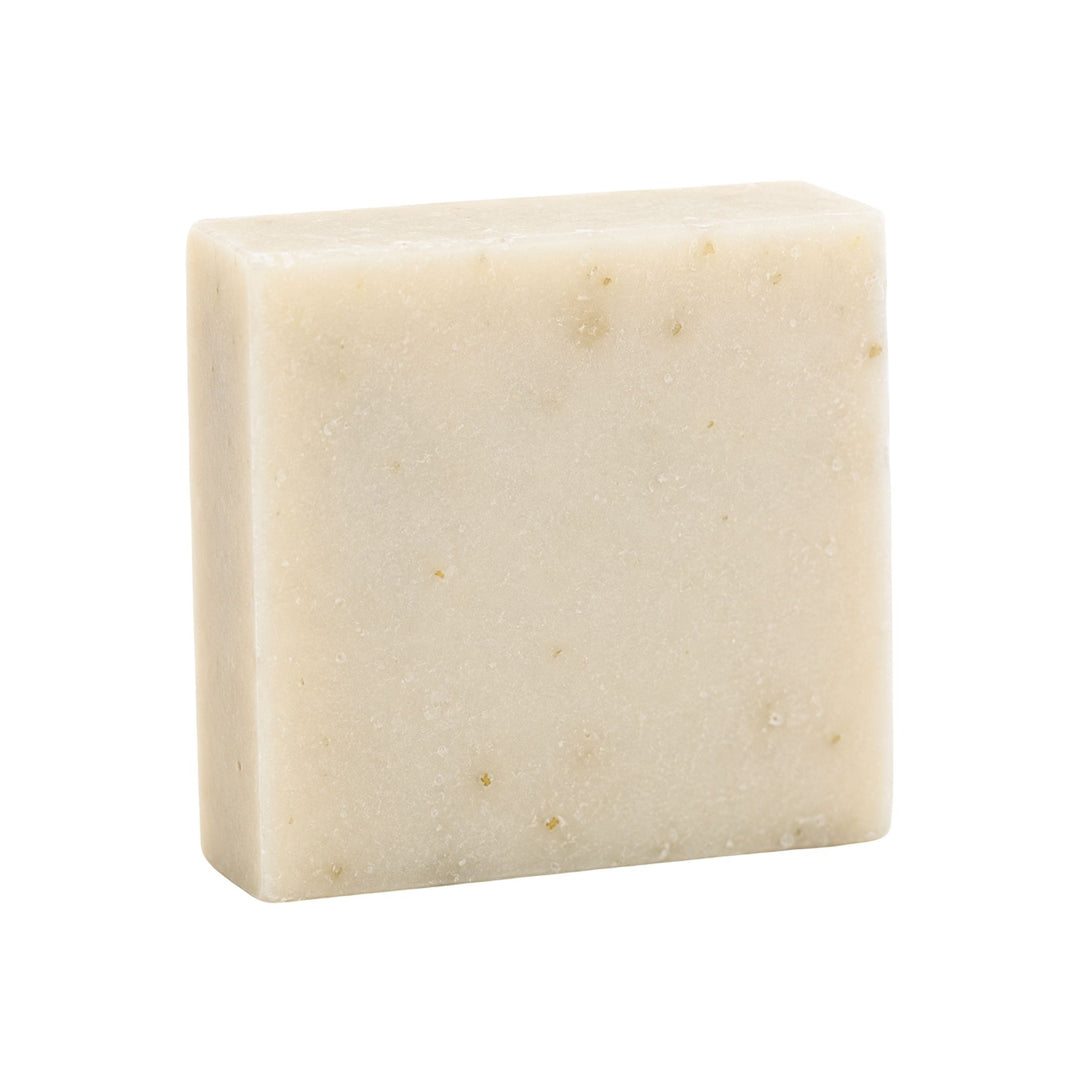 Cherry Amaretto soap bar with a muted mauve tone and natural speckled texture on a white background.