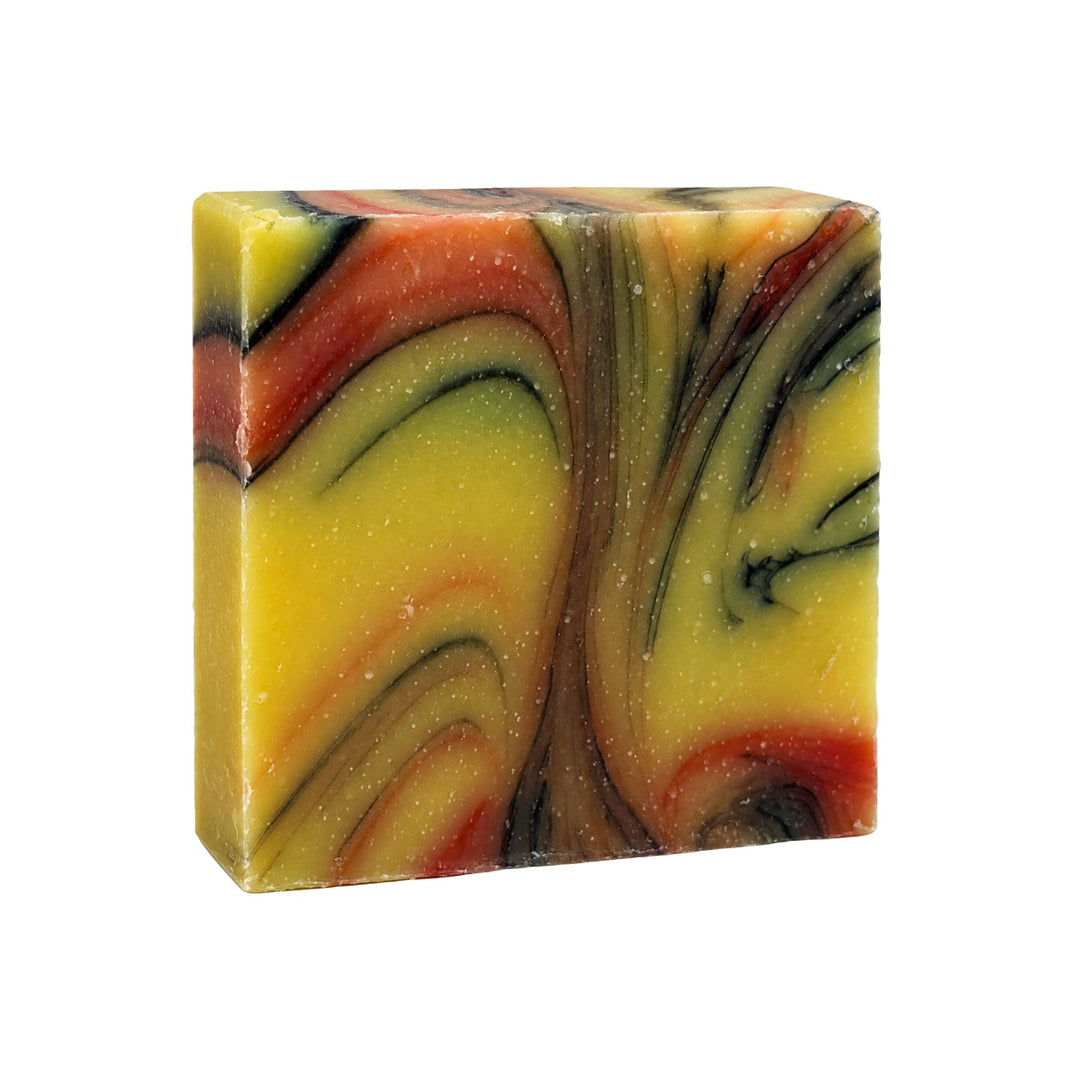 Desert Gold Soap Bar with yellow, amber, olive green, and charcoal swirls on a white background.