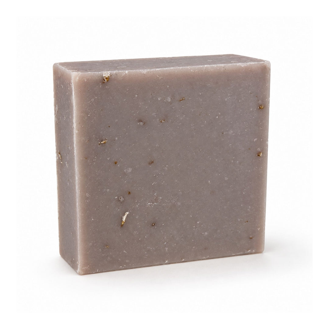 Honey Oat Cream soap bar in soft cream with subtle natural flecks and a handmade texture on a white background.