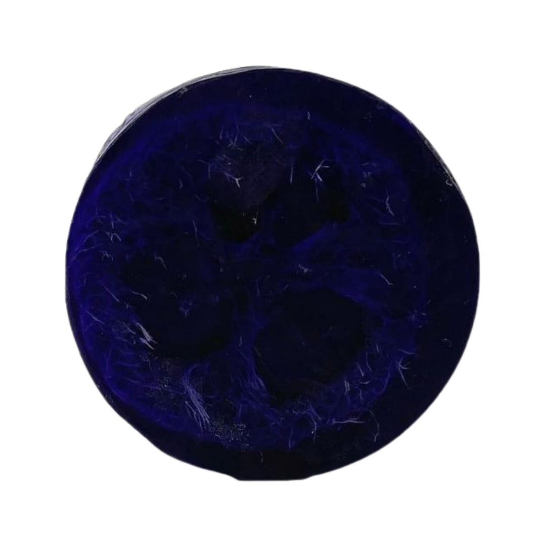 Deep purple Island Bloom Loofah Soap with a natural loofah center on a white background.