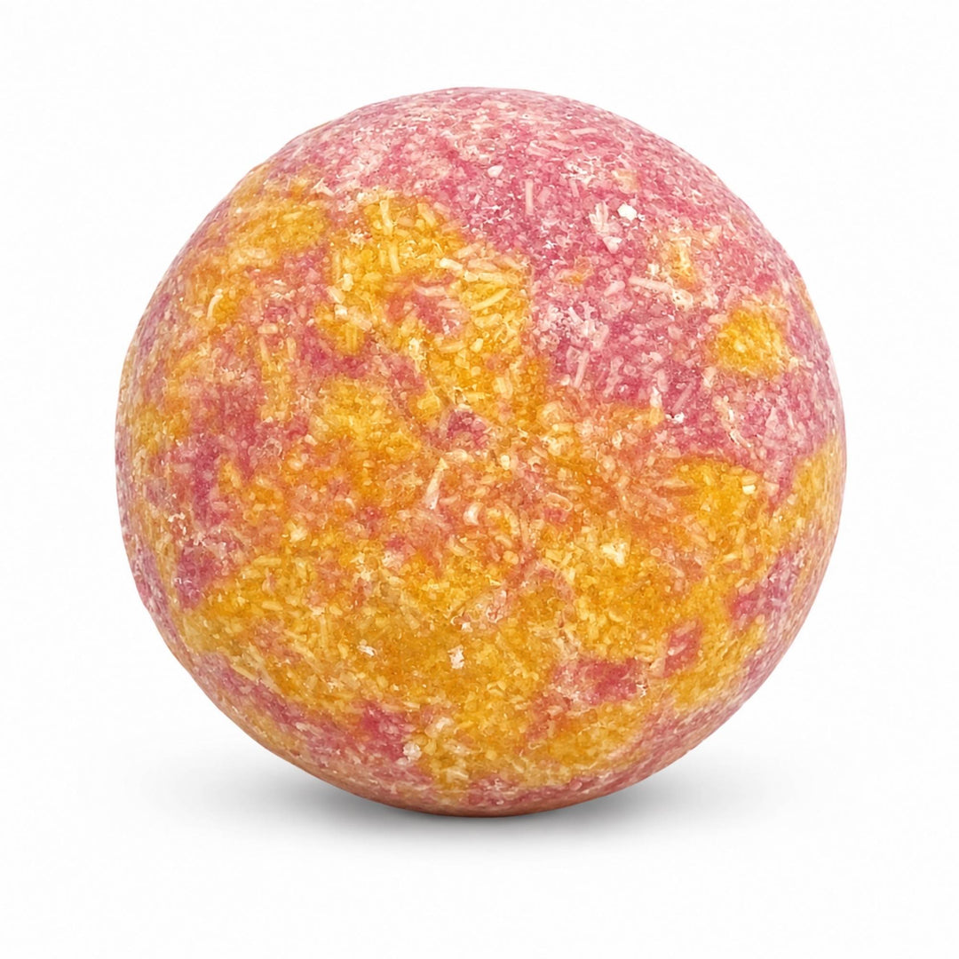 Dirty Bee Pink Sands Shampoo Bar, a round textured shampoo bar with a marbled pink and orange-yellow surface, on a white background.