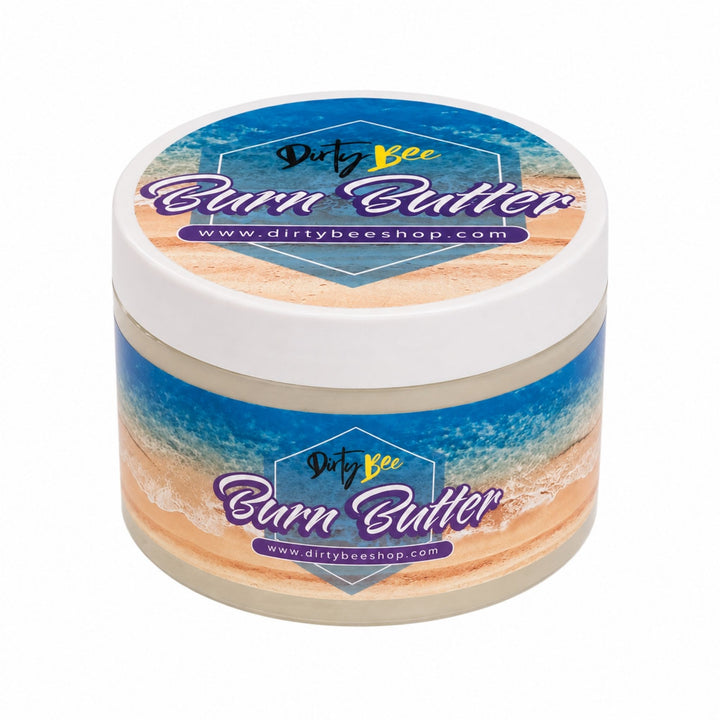 Dirty Bee Burn Butter jar centered on a white background, shown closed with the beach-inspired label facing forward