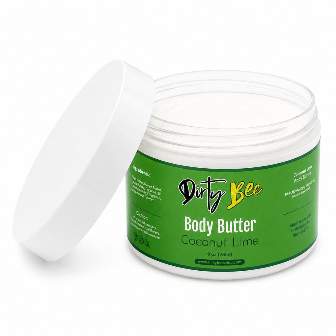 Dirty Bee Coconut Lime Body Butter in an open clear jar with white lid on a white background.